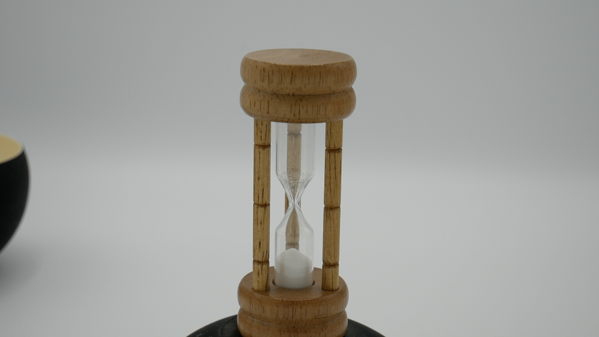 A photograph of a sand timer