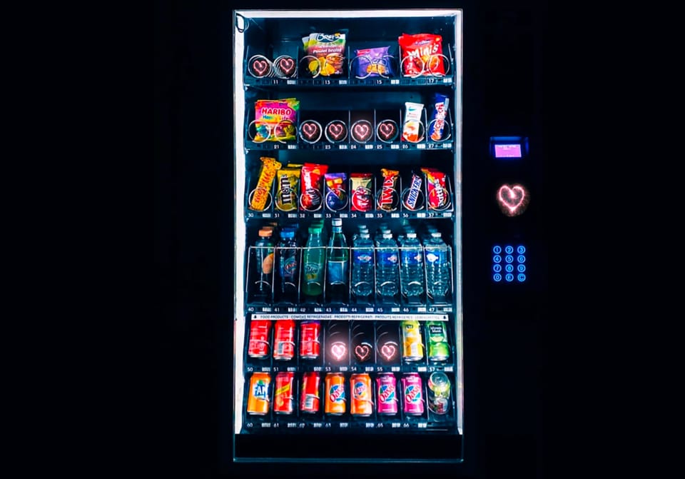 A modified image of a vending machine with the heart as an available product