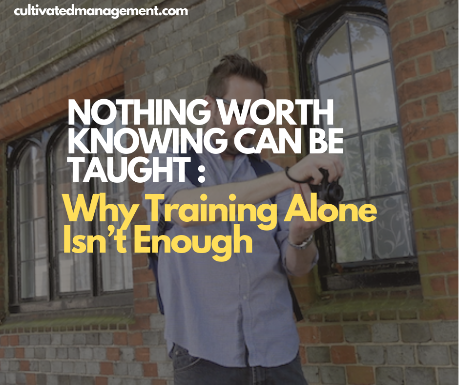 A photo of Rob Lambert taking a photo in winchester with the words overlaid - Nothing worth knowing can be taught : Why Training Alone Isn’t Enough